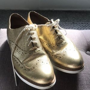 Cole Haan gold lace up oxfords